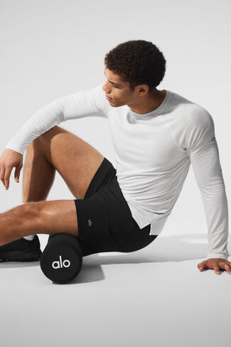 Alo Yoga Triumph Long Sleeve Tee - White in Saudi Arabia