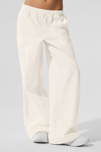 Alo Yoga High-Waist Origin Wide Leg Track Pant - Ivory in Saudi Arabia
