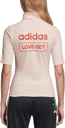 تي شيرت نسائي من adidas Love برقبة وهمية، وردي فاتح (M) in Saudi Arabia