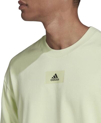 سويت شيرت رجالي من Adidas Essentials FeelVivid بكتف منسدل، ليموني تقريبًا in Saudi Arabia