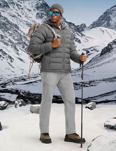 Rdruko Men's Snow Pants Waterproof Insulated Winter Ski Hiking Fleece Lined Outdoor Softshell Pants in Saudi Arabia