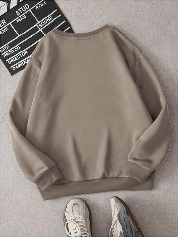 SweatyRocks Women's Casual Graphic Sweatshirt Long Sleeve Crewneck Oversized Fleece Pullover Tops in Saudi Arabia