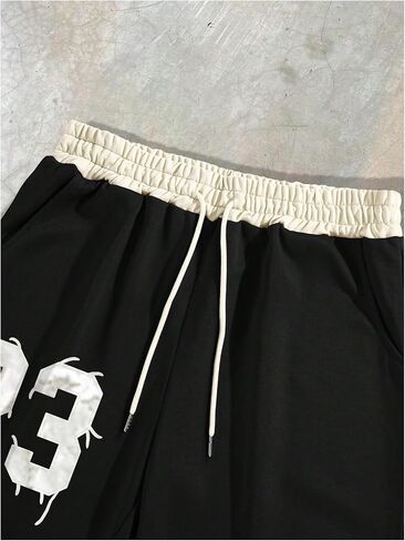 Verdusa Men's Graphic Street Wear Sweatpants Hip Hop Drawstring Waist Baggy Casual Loose Track Pants in Saudi Arabia