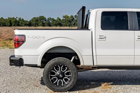 غطاء تونيو لسرير الشاحنة قابل للطي ثلاثي الطي من Rough Country لسيارة Ford F-150 (2004-2014) - يناسب سرير مقاس 6'7 بوصة (78.8 بوصة)، وألواح ألومنيوم متدفقة مناسبة لجميع الأحوال الجوية in Saudi Arabia