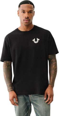 تي شيرت رجالي قصير الأكمام منتفخ برسومات جرافيتي من True Religion - تي شيرت كاجوال برقبة دائرية ورسومات جرافيك in Kuwait