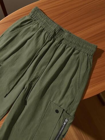 Ladies' Casual Pants。High-Waisted Cargo Jogger Pants, Elastic Waistband, Multiple Pockets, Available in Black and Khaki in Saudi Arabia