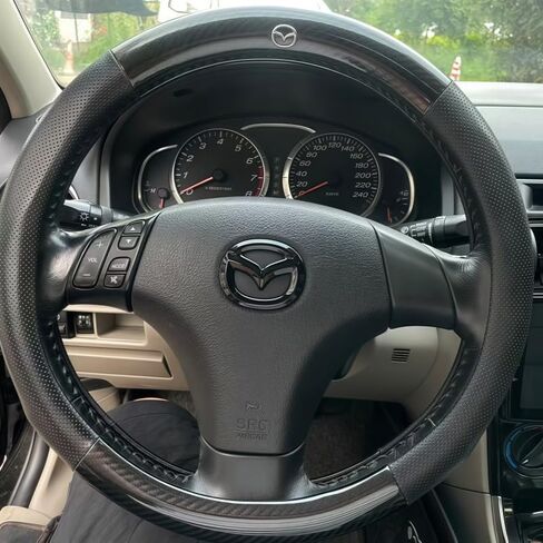 غطاء شعار عجلة قيادة السيارة لسيارة Mazda 3/Axela Hatchback 2004 2005 2006 2007 2008 2009 2010، ملصقات ملصقات لشعار عجلة القيادة، ذاتية اللصق مضادة للخدش، ملصق عجلة القيادة، A in Saudi Arabia