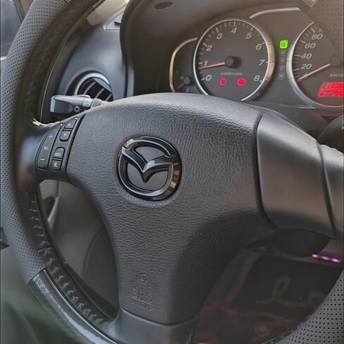 غطاء شعار عجلة قيادة السيارة لسيارة Mazda 3/Axela Hatchback 2004 2005 2006 2007 2008 2009 2010، ملصقات ملصقات لشعار عجلة القيادة، ذاتية اللصق مضادة للخدش، ملصق عجلة القيادة، A in Saudi Arabia