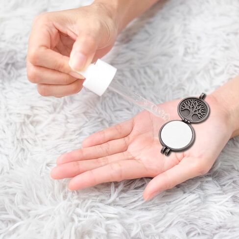Larrel 100 Pcs Round Aromatherapy Pad, 0.88in White Round Essential Oil Pads Aromatherapy Pad 2.25cm Replacement Refill Pads for Essential Oil Diffuser Necklace Humidifier Home Car in Saudi Arabia