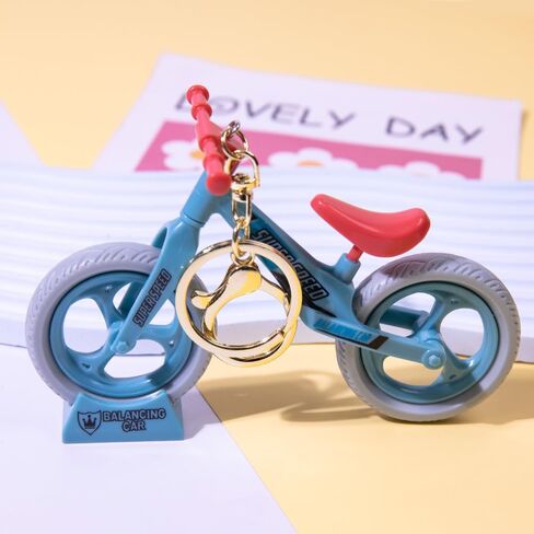 Adorable Blue Mini Balance Bike Keychain Creative Movable Bicycle Charm Accessories Niche Design Backpacks Keychains Ornament for Couple in Saudi Arabia