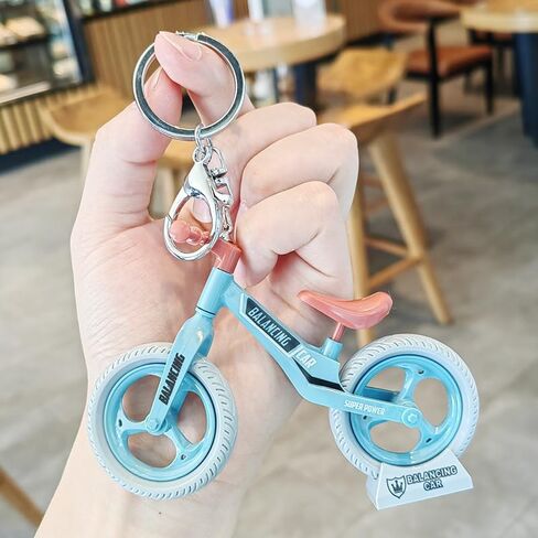 Adorable Blue Mini Balance Bike Keychain Creative Movable Bicycle Charm Accessories Niche Design Backpacks Keychains Ornament for Couple in Saudi Arabia