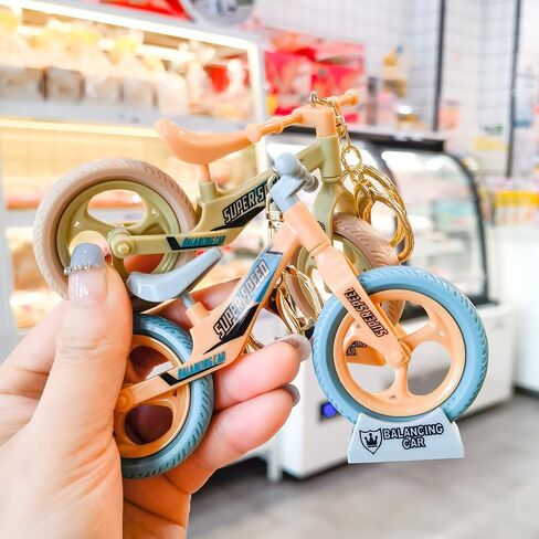 Adorable Blue Mini Balance Bike Keychain Creative Movable Bicycle Charm Accessories Niche Design Backpacks Keychains Ornament for Couple in Saudi Arabia