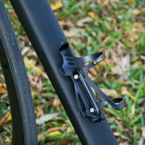 قفص زجاجة مياه تحميل من الجانب الأيسر من Corki Cycles، حامل زجاجة مياه للدراجة ذات مدخل جانبي للدراجات على الطرق والجبال - عبوة واحدة - سبائك الألومنيوم البرتقالية in Saudi Arabia