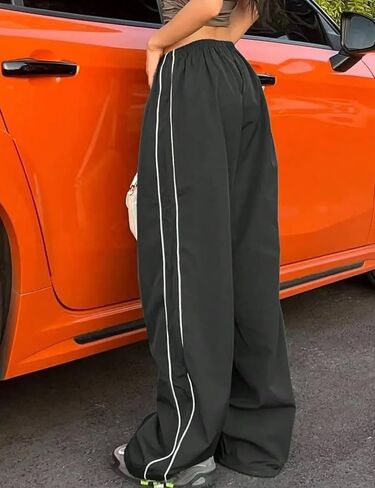 سروال نسائي فضفاض مظلي كاجوال بخصر مطاطي وواسع الساق للركض بنطلون رياضي Y2k مع جيوب in Saudi Arabia