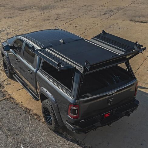غطاء سرير شاحنة Rough Country لسرير Ram 1500 (2019-2025) مقاس 5'7 بوصات - غطاء معياري مقاوم للطقس مع أبواب Gullwing قابلة للقفل، وإضاءة LED، ولوحات مولي، بتصنيف 750 رطل in Saudi Arabia