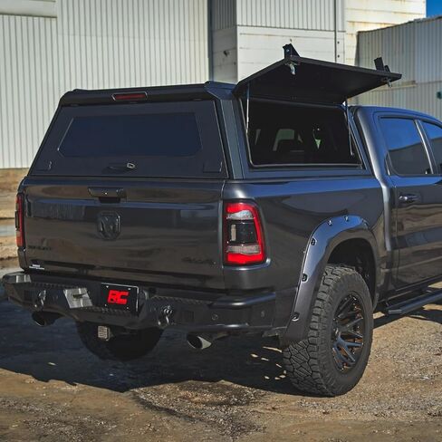غطاء سرير شاحنة Rough Country لسرير Ram 1500 (2019-2025) مقاس 5'7 بوصات - غطاء معياري مقاوم للطقس مع أبواب Gullwing قابلة للقفل، وإضاءة LED، ولوحات مولي، بتصنيف 750 رطل in Saudi Arabia