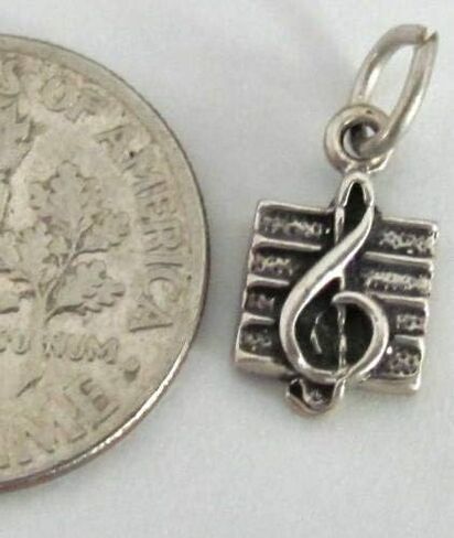 JOELLE STORE Sterling Silver 925 Small Music clef mini tiny charm. JOELLE STORE in Saudi Arabia