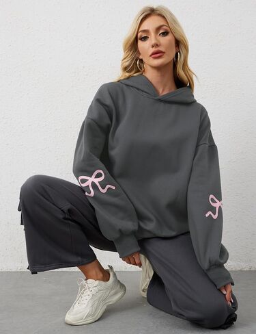 Womens Bow Print Hoodies Fleeced Oversized Hooded Sweatshirts Long Sleeve Cute Graphic Drop Shoulder Pullover Tops in Saudi Arabia