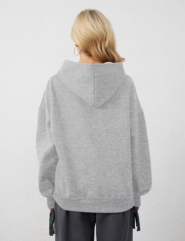 سترة نسائية بغطاء للرأس مطبوعة بفيونكة كبيرة الحجم ومزودة بغطاء للرأس وأكمام طويلة ورسومات لطيفة وكتف منسدل in Kuwait