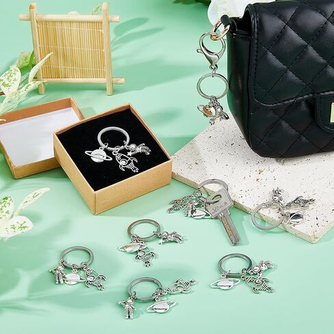 SUPERFINDINGS 16Pcs Planet Astronaut Keychain Alloy Spaceman Rocket Charms Pendants Keyring Space Theme Accessories with Keyring Astronaut Space Party Favors for Backpack Bag Purse Gifts in Saudi Arabia