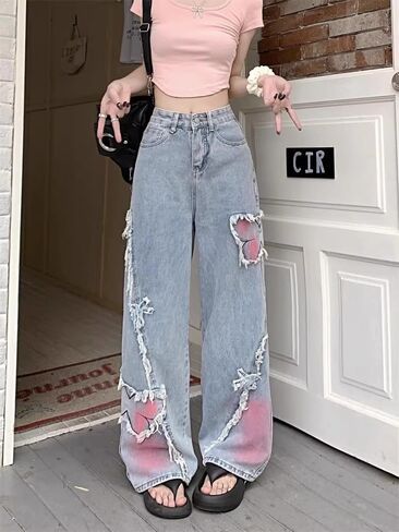 Y2K Baggy Ripped Jeans for Women – Wide Leg Butterfly Print & Star Patch Distressed Denim Pants High Waist Streetwear in Saudi Arabia
