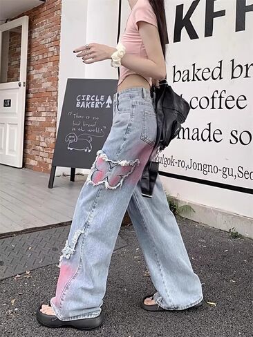 Y2K Baggy Ripped Jeans for Women – Wide Leg Butterfly Print & Star Patch Distressed Denim Pants High Waist Streetwear in Saudi Arabia