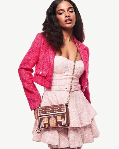 Betsey Johnson Baking Spirits Bright Wallet Crossbody in Saudi Arabia