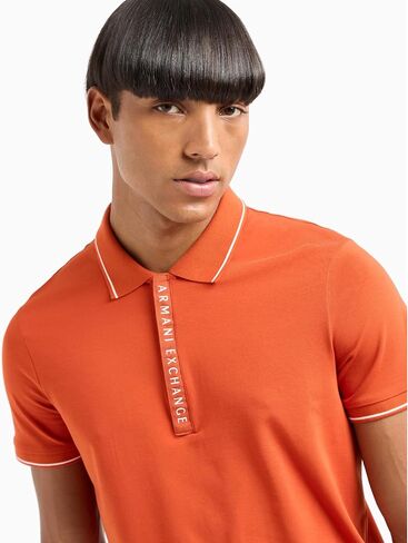 قميص بولو بسحاب للرجال من Armani Exchange مصنوع من قطن جيرسي مطاطي بقصة ضيقة، Rooibos Tea/White، مقاس كبير in Saudi Arabia