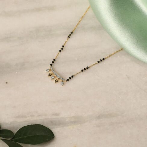 قلادة مانغالسوثرا الأنيقة من الفضة الإسترلينية من تارينيكا مع تصميم سحر الأزهار (مطلي بالذهب) - قلادة سلسلة فضية للنساء | مثالي للمناسبات العرقية | اطقم مجوهرات هندية للنساء | 1 سنة in Kuwait