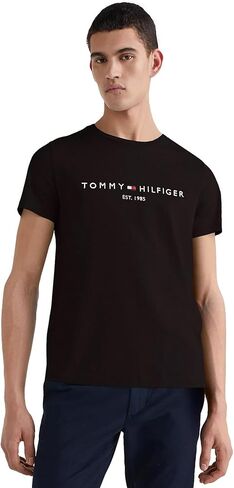 تي شيرت Tommy Hilfiger رجالي ذو مقاس عادي ومطرز بشعار Tommy برقبة دائرية، أسود، مقاس XL in Saudi Arabia