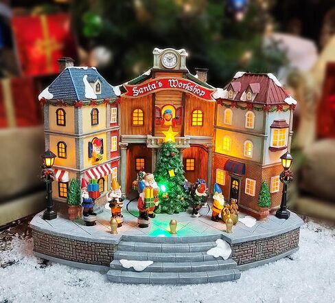 Christmas Village Centerpiece Decor, Tiered Village Town Center, with Rotating Train and Village Buildings, featuring LED Lights, Christmas Music, and Animation - Power Adapter (included) in Saudi Arabia