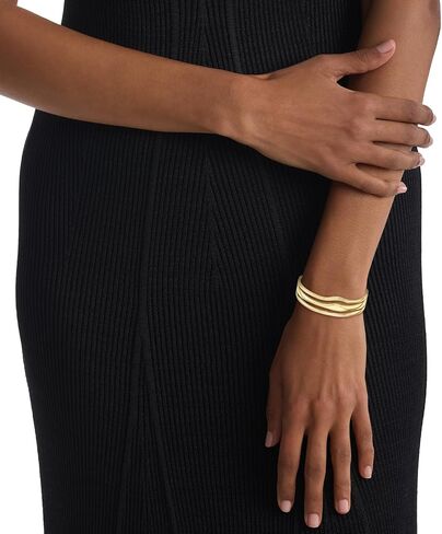 Calvin Klein Wavy Bangle Bracelet for Women - Stainless Steel with Hinge Closure - Modern Elegance - Premium Fashion Jewelry Accessory - Gift for Her in Saudi Arabia