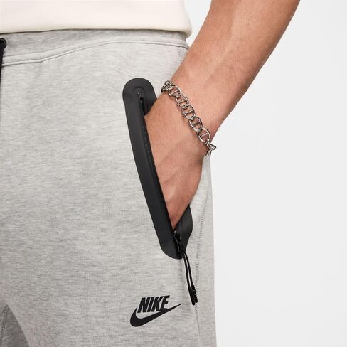 TECH Fleece بنطال بحاشية مفتوحة "رمادي هيذر" in Saudi Arabia