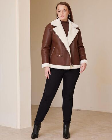 سترة نسائية من الجلد الصناعي من الفرو الصناعي مقاس كبير معطف فضفاض مبطن بالفرو للدراجات النارية in Kuwait