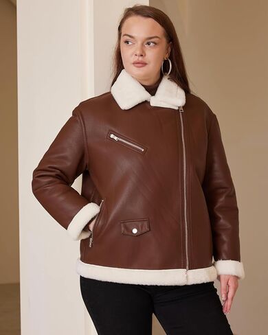 سترة نسائية من الجلد الصناعي من الفرو الصناعي مقاس كبير معطف فضفاض مبطن بالفرو للدراجات النارية in Kuwait