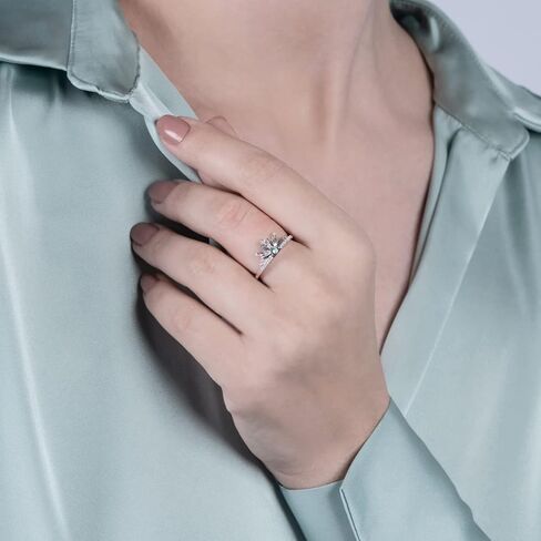 Jewelili Enchanted Disney Fine Jewelry من الفضة الإسترليني مع 1/10 قيراط من الماس والتوباز الأزرق السماوي فروزن 2 خاتم إلسا ندفة الثلج in Saudi Arabia