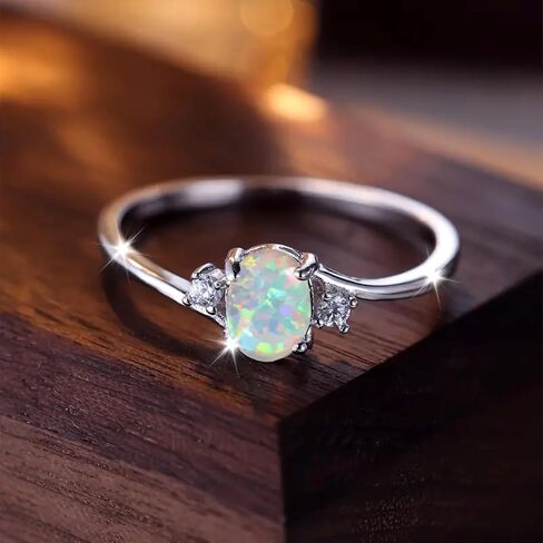 Premium Silver Plated Ring Inlaid with Opal in Egg Shape, Premium Jewelry for Women, Ideal for Daily Outfits and Special Occasions in Saudi Arabia