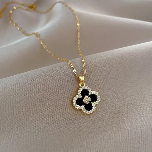 Gold Tone Necklace with Black Enamel Pendant, Crystals Four leaf Clove Charm in Saudi Arabia