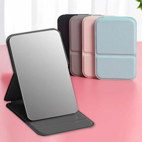 Portable Handheld Personal Makeup Mirror Foldable Solid Color PU Leather Simple Mini Compact Cute Pocket Mirror,Black (7 * 10.5cm) in Saudi Arabia