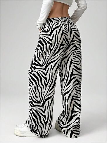 بنطلون Verdusa النسائي ذو المقاس الكبير بطبعات الحيوانات للتمارين الرياضية، بنطلون طويل بأرجل مستقيمة مع جيوب in Kuwait