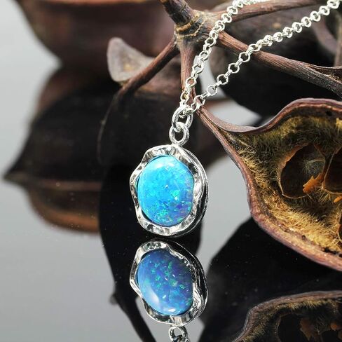 Stera Jewelry Sterling Silver Necklace & 10mm Shimmering Created Blue or White Opal Round Pendant in Saudi Arabia