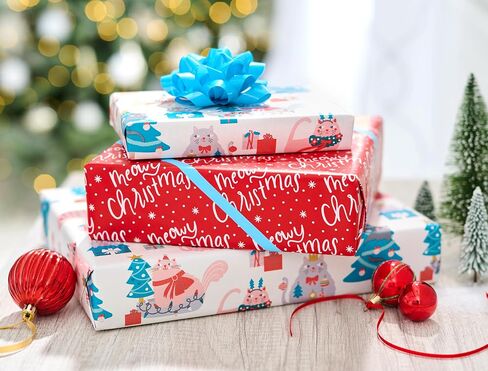 American Greetings Reversible Christmas Wrapping Paper, Dogs, Paw Prints and Snowflakes (1 Roll, 175 sq. ft.) in Saudi Arabia
