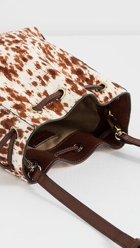 حقيبة دلو نسائية مصنوعة من جلد البقر برباط من Madewell in Saudi Arabia