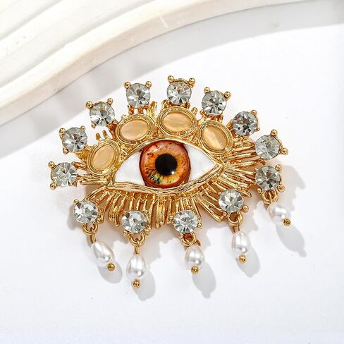 Evil Eye Brooch Fashion Unique Elegant Rhinestone Vintage Lucky Charms Eye Brooch Enamel Tassel Pearl Pin Clothing Jewelry Clothing Backpack Jacket Hat Decoration DIY in Saudi Arabia