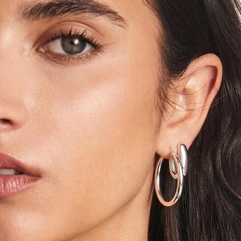 Kendra Scott Ellen Wide Huggie Earrings in Saudi Arabia