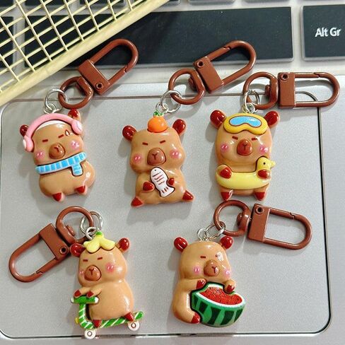 12Pcs Cute Capybara Keychains Kawaii Sport Capybara Pendant Accessories for DIY Bag Charm Phone Charms Wallet Birthday Christmas Gifts in Saudi Arabia