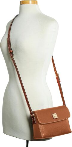 حقيبة يد Dooney & Bourke، حقيبة كروس من Pebble Grain Rena | عظم in Saudi Arabia