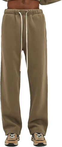 بنطال شتوي فضفاض للرجال من القطن بنطال رياضي كاجوال فضفاض برباط مع جيوب in Kuwait