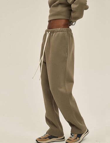 بنطال شتوي فضفاض للرجال من القطن بنطال رياضي كاجوال فضفاض برباط مع جيوب in Kuwait