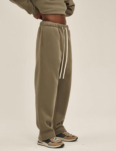 بنطال شتوي فضفاض للرجال من القطن بنطال رياضي كاجوال فضفاض برباط مع جيوب in Kuwait